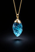 Water Element Necklace - raw blue stone with gold-tone wrap